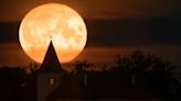 AP Fotos: Did you see it? Supermoon graces skies worldwide