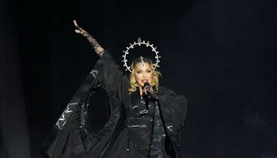 Sexuality at Madonna show upsets concertgoer; now he’s suing her