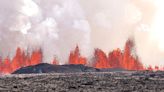 Iceland volcano dramatically erupts again as streams of lava reach town’s defensive walls