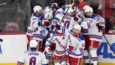 Wennberg scores in OT, Rangers top Panthers 5-4 to take lead in East finals