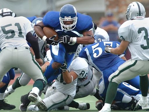 Former Michigan linebacker, Grand Rapids Catholic star, dies at 36