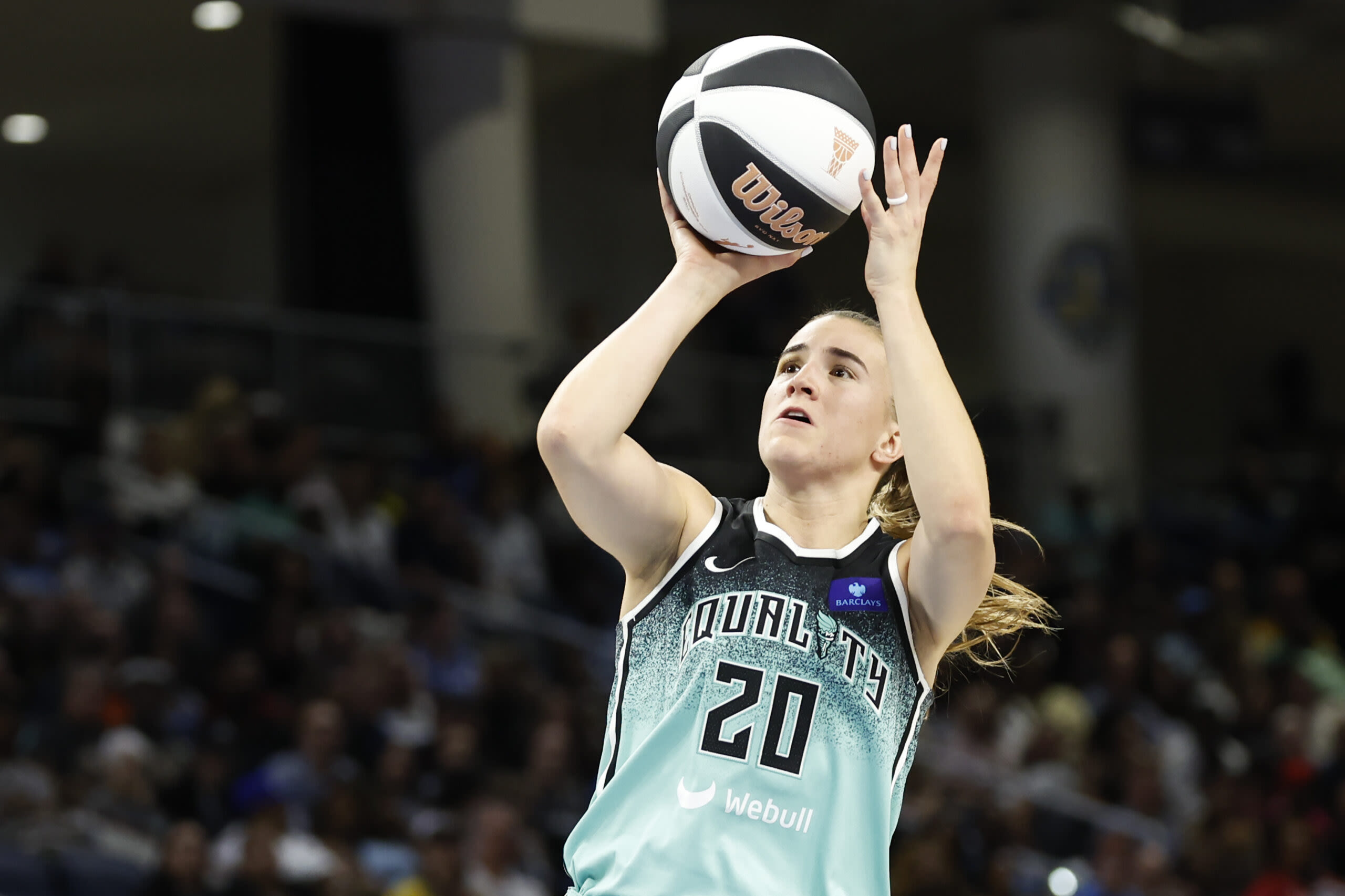 Sabrina Ionescu and Lebron James share a hug after the Liberty’s win over Las Vegas