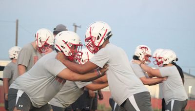 HIGH SCHOOL FOOTBALL: Fall practices begin bright and early for area schools