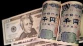 Dollar rises to five-month high, puts heat on yen
