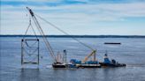 Third, final large segment of Baltimore’s Key Bridge lifted out of water Tuesday morning