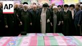 Iran's supreme leader and Hamas chief at funeral ceremony for late Iranian president