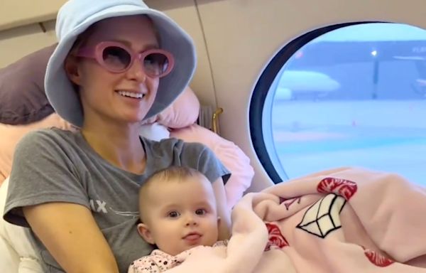 Paris Hilton Shares Adorable Videos of Daughter London Wrapped in a ‘That’s Hot’ Blanket Inside a Jet on Family Vacation