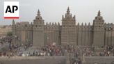 Mali's Great Mosque of Djenne is re-plastered in annual ritual