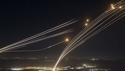 Hezbollah fires dozens of rockets at Israel as full-blown war fears explode