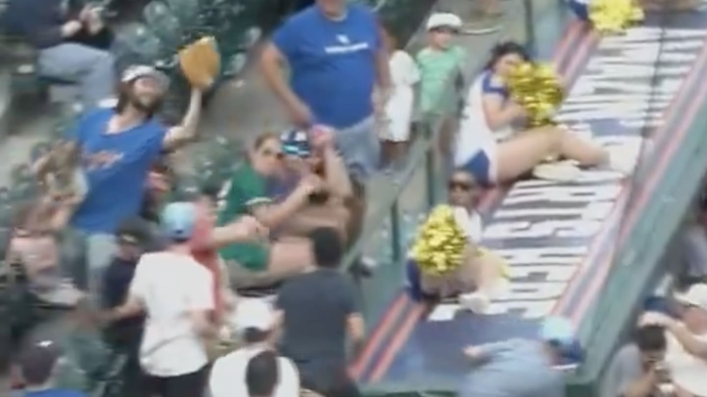 Brooklyn Cyclones Fan Catches Foul Ball While Holding a Baby