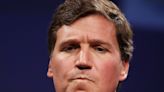 Text shows Tucker Carlson describing how a 'group of Trump guys' jumped an 'Antifa kid,' saying, 'It's not how white men fight'