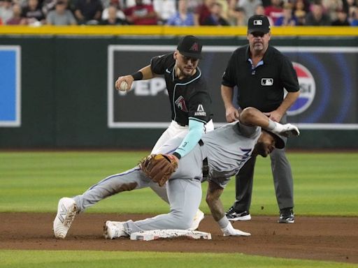 Weathers, Burger help Marlins dump Diamondbacks for fourth series victory in a row