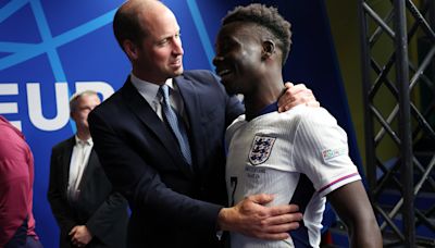 William hugs Saka as he congratulates England on reaching Euro semi-finals