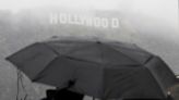 Southern California shivers in blizzard conditions as tornadoes threaten LA and 114,000 without power