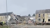 One missing and three in hospital after explosion at Swansea home