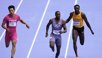 Noah Lyles closes strong to advance in 1st round of the 100 in Paris as he pursues an Olympic double
