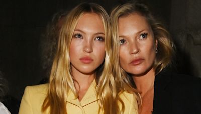 Lila and Kate Moss twin in head-to-toe black outfits during PFW