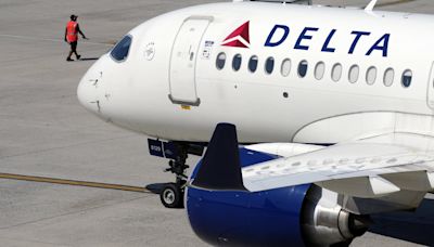 Delta Air Lines says cancellations continue as it tries to restore operations after tech outage