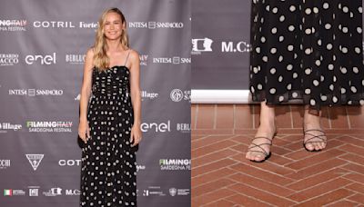 Brie Larson Slides On Dainty Strappy Flats to Complement Polka Dot Doên Dress at Filming Italy 2024