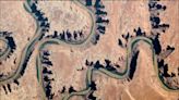 Space view of Green River flowing through 1,000-foot-deep 'Labyrinth Canyon'