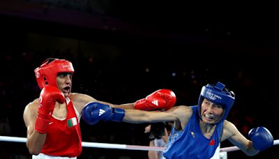 Imane Khelif, boxer engulfed in Olympics gender controversy, declares 'I am a woman like any other woman' after winning gold