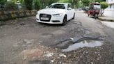 Potholed Cool Road gives commuters a bumpy ride