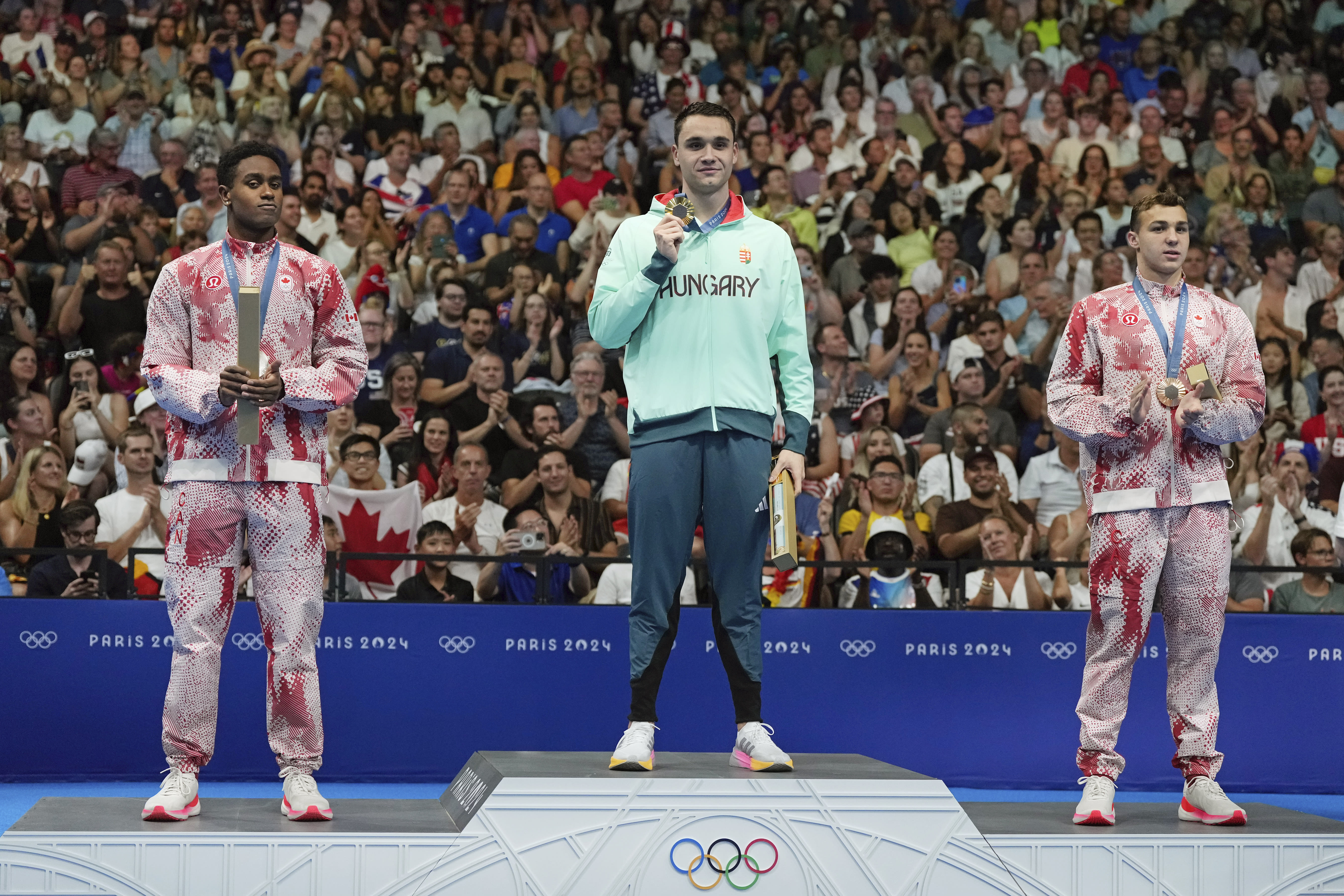 Olympic fans divided over Team Canada's polarizing Lululemon uniforms during 2024 Paris Games: 'Inspired by bacon'