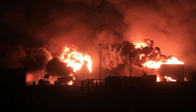 Firefighters struggle with blaze at Yemen's Hodeida port after Israeli strike