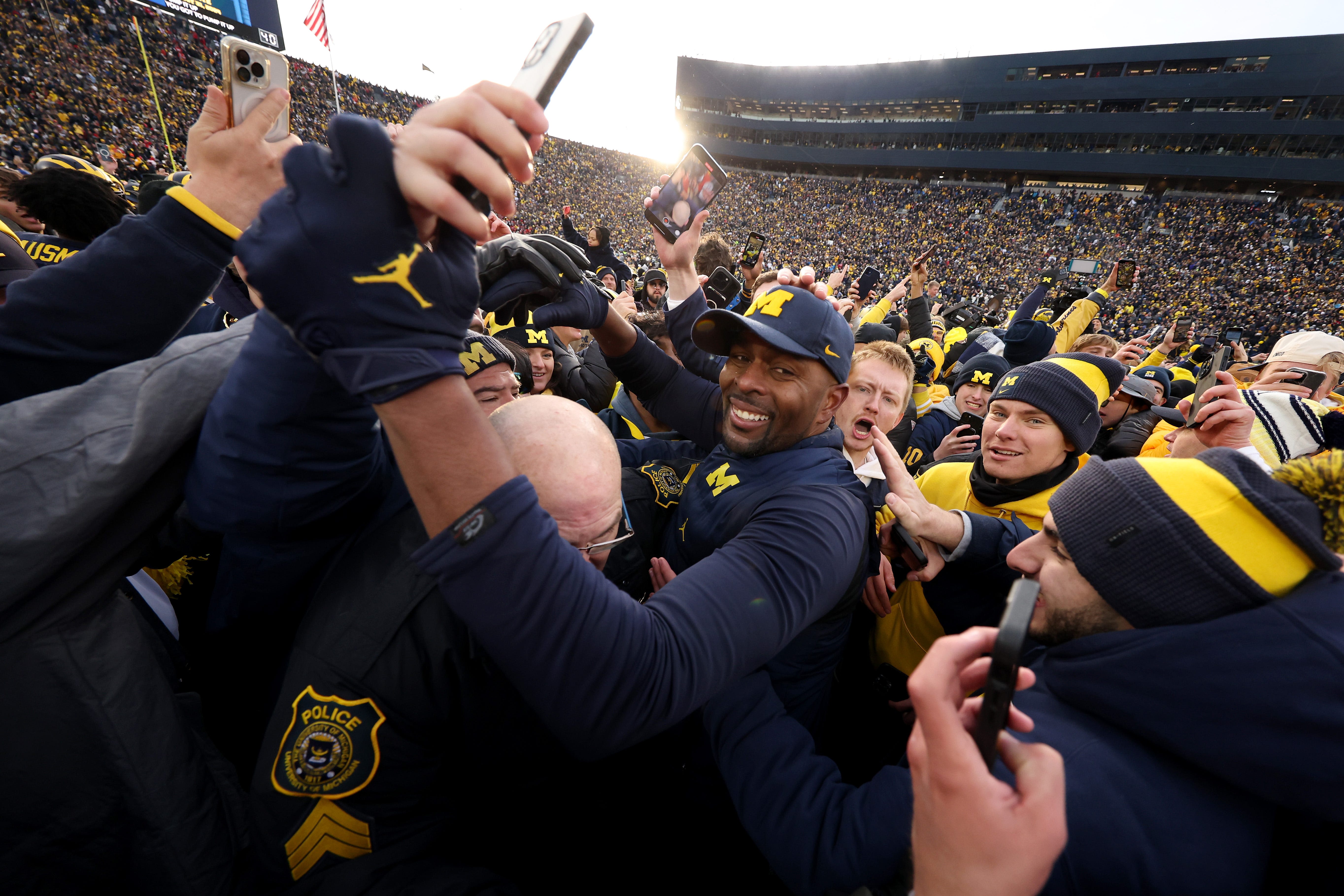 Michigan coaches, 'team atmosphere' a different world for Wes Walker compared to previous stops