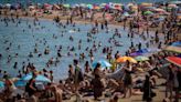 Spanish town to fine tourists for hogging beach spots