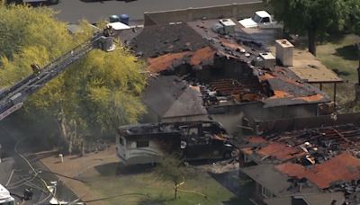 Several houses heavily damaged by fire driven by wind