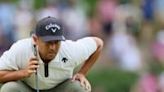 Xander Schauffele clung to a one-stroke lead as he began the back nine in the third round of the PGA Championship