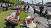 Can you spot yourself? Glaswegians pictured enjoying sunshine at Clyde side