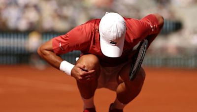 Novak Djokovic’s Wimbledon and Olympic hopes in jeopardy after knee injury
