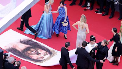 The same Cannes security guard went viral for shooing 4 celebs. What's going on?