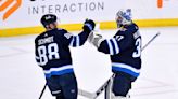 Hellebuyck stops 29 shots, Jets beat Coyotes 2-1