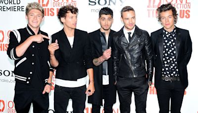 One Direction star spotted on night out with soul singer at burger restaurant