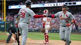 Cardinals snap Phillies home win streak with extra inning victory