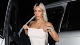 Kim Kardashian Wears Skintight Skims Dress for Late Night at the Office