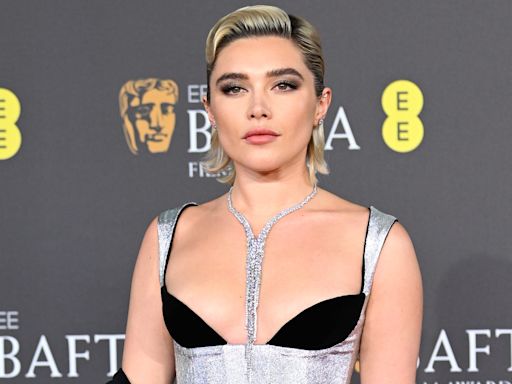 Business babes flash their bras, according to Florence Pugh