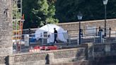 Human remains found in suitcases on bridge 'belong to 2 adult men'