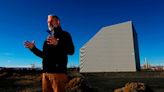 Cocooning the past. Plutonium reactor in Eastern WA encased in steel to protect the river