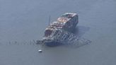 Watch blast break up Francis Scott Key Bridge span atop cargo ship in Baltimore