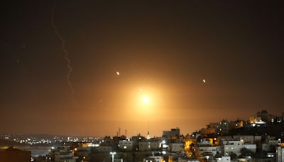 Iran launches 180 missiles into Israel as civilians rush to bomb shelters