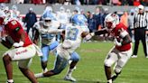 Helmet stickers for UNC’s letdown at NC State