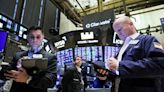 Wall St flutters, Treasury yields ease as Powell resumes testimony