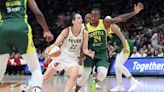 Jewell Loyd scores 32 points and Storm hold off Caitlin Clark and Fever