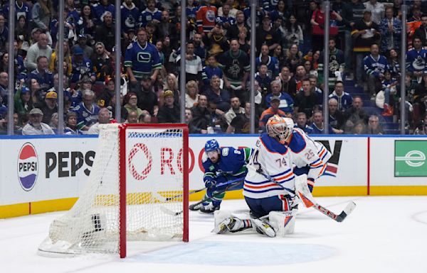 Canucks overcome 3-goal deficit to stun Oilers 5-4 in Game 1