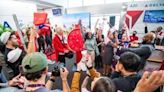 Sir Richard Branson surprises some Delta flyers in Atlanta with free vacation