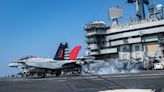A Navy jet just landed on the aircraft carrier USS Nimitz for the 350,000th time, but the famous flattop's days are numbered